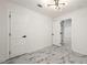 Spacious bedroom with marble-look floors and access to another room at 641 Hamilton E Holmes Nw Dr, Atlanta, GA 30318