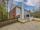 Backyard with a deck, patio and fence in a wooded neighborhood at 3549 Meadow Chase Dr, Marietta, GA 30062
