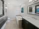 Elegant primary bathroom featuring double sinks, a soaking tub and modern finishes throughout at 3549 Meadow Chase Dr, Marietta, GA 30062