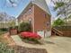Brick two-story home with mature landscaping, two-car garage, and a separate entry at 3549 Meadow Chase Dr, Marietta, GA 30062