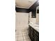 Bathroom features tiled floors, shower and granite topped vanity at 115 Bond Dr, Ellenwood, GA 30294
