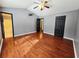 Bedroom features hardwood floors, en suite bathroom and large closet at 115 Bond Dr, Ellenwood, GA 30294