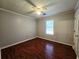 Cozy bedroom with natural light and hardwood floors at 115 Bond Dr, Ellenwood, GA 30294