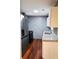 Efficient kitchen with granite countertops and stainless steel appliances at 115 Bond Dr, Ellenwood, GA 30294