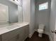 Small half bathroom with sink and toilet at 700 Banton Nw Dr, Atlanta, GA 30318