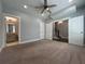 Large bedroom with ceiling fan and access to bathroom at 700 Banton Nw Dr, Atlanta, GA 30318
