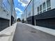 View down a residential street with garages at 700 Banton Nw Dr, Atlanta, GA 30318