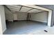 Spacious garage with painted floor and storage at 700 Banton Nw Dr, Atlanta, GA 30318