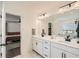 Double vanity bathroom with marble countertops and modern fixtures at 640 Avondale Park Cir, Decatur, GA 30032