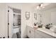 Modern bathroom with double vanity sinks and tile flooring at 640 Avondale Park Cir, Decatur, GA 30032