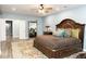 Bedroom with a large bed, and ornate wood trim at 86 Waterford Path, Hiram, GA 30141