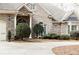 Beautiful home showcasing a well-maintained lawn, driveway and partial stone and brick exterior at 86 Waterford Path, Hiram, GA 30141
