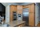 Well-equipped kitchen features stainless steel appliances, double ovens, and abundant maple cabinetry at 86 Waterford Path, Hiram, GA 30141