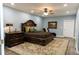 Spacious main bedroom with a large bed, a ceiling fan, and a decorative rug at 86 Waterford Path, Hiram, GA 30141