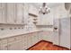 Classic kitchen with white cabinetry, tile backsplash, and stainless steel appliances at 3649 Peachtree Ne Rd # 201, Atlanta, GA 30319
