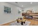 Bright living room with modern fireplace and large windows at 6914 Fairway Trl, Austell, GA 30168