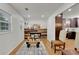 Bright living room featuring a modern fireplace and hardwood floors at 6914 Fairway Trl, Austell, GA 30168