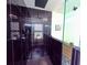 Contemporary tiled shower with honeycomb-patterned storage niches and a rainfall shower head at 6914 Fairway Trl, Austell, GA 30168