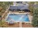Inviting backyard oasis featuring a sparkling pool and ample patio space at 956 Cardova Dr, Atlanta, GA 30324