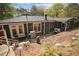 Charming home with a spacious backyard, patio, and built-in grill at 956 Cardova Dr, Atlanta, GA 30324