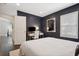 Spacious bedroom with a comfortable bed and built in workspace at 956 Cardova Dr, Atlanta, GA 30324
