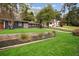 Ranch home with a beautifully landscaped front yard at 956 Cardova Dr, Atlanta, GA 30324