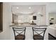 Contemporary kitchen with white cabinets and a sleek countertop at 956 Cardova Dr, Atlanta, GA 30324