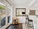 Modern kitchen with white cabinetry and a breakfast bar at 956 Cardova Dr, Atlanta, GA 30324