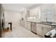 Modern kitchen with stainless steel appliances and white shaker cabinets at 956 Cardova Dr, Atlanta, GA 30324