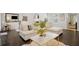 Open living space featuring a white sectional sofa and a stylish coffee table at 956 Cardova Dr, Atlanta, GA 30324