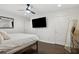 Main bedroom with king bed, large TV, and ample closet space at 956 Cardova Dr, Atlanta, GA 30324