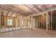 Unfinished basement with exposed framing and concrete foundation at 6478 Beaver Creek Trl, Atlanta, GA 30349