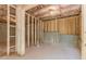 Unfinished basement with exposed framing, offering potential for customization at 6478 Beaver Creek Trl, Atlanta, GA 30349