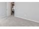 Bedroom with neutral carpet leading to another room with light coming in at 6478 Beaver Creek Trl, Atlanta, GA 30349