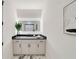 Modern bathroom featuring a sleek vanity, illuminated mirror, and stylish decor at 247 Huntington Ne Rd, Atlanta, GA 30309