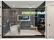 Spa-like bathroom featuring a luxurious soaking tub, rainfall shower, and elegant finishes at 247 Huntington Ne Rd, Atlanta, GA 30309