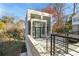 Modern brick home with large windows showcasing a contemporary design at 247 Huntington Ne Rd, Atlanta, GA 30309