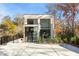 Modern brick home with large windows and minimalist landscaping offering a sleek aesthetic at 247 Huntington Ne Rd, Atlanta, GA 30309