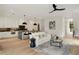 Spacious living room showcasing an open layout with kitchen access and elegant decor, ideal for gatherings at 247 Huntington Ne Rd, Atlanta, GA 30309