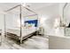 Stylish bedroom featuring a four-poster bed and modern decor at 5483 Wylstream, Norcross, GA 30093