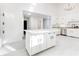 Modern kitchen with an island, stainless steel appliances, and ample storage at 5483 Wylstream, Norcross, GA 30093