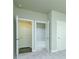 Bedroom featuring multiple closets, neutral walls, and plush carpeting at 5380 Deer Run Dr, Conyers, GA 30094