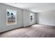 Walk-in closet with ample storage, natural light, and views of the home's exterior at 5380 Deer Run Dr, Conyers, GA 30094