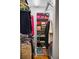 Well-organized walk-in closet with hanging rods and shelving at 1384 Jefferson Ave, East Point, GA 30344