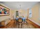 Bright dining room with a round table and a beautiful chandelier at 1384 Jefferson Ave, East Point, GA 30344