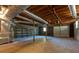 Unfinished basement garage with shelving and extra storage space at 2878 London Ne Ct, Marietta, GA 30062