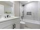 Modern bathroom with white vanity and marble tile at 2878 London Ne Ct, Marietta, GA 30062