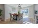 Bright dining room with hardwood floors and modern chandelier at 2878 London Ne Ct, Marietta, GA 30062