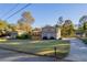 Two story home with gray siding, new deck and landscaping at 2878 London Ne Ct, Marietta, GA 30062