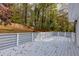 Spacious deck with wooden railings overlooking a wooded area at 3936 Devonshire Dr, Marietta, GA 30066